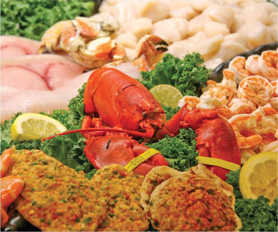 Lobster surrounded by seafood